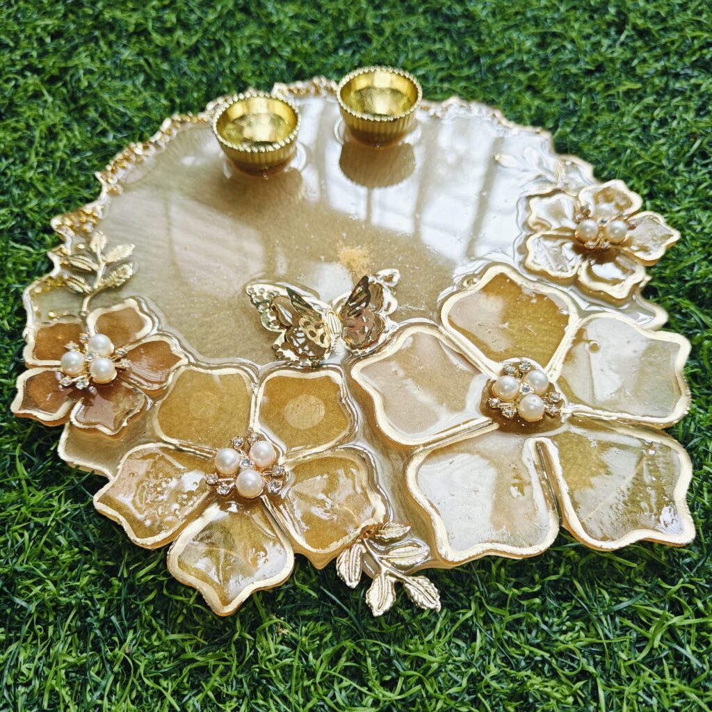 Gold-toned floral resin tray with pearl embellishments and butterfly detail. Resin Art for Festivals 